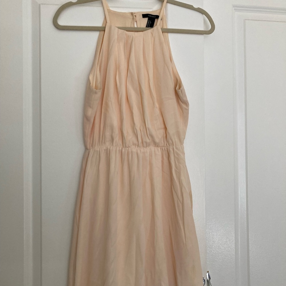 Peach high neck open back semi formal dress; note stain on front